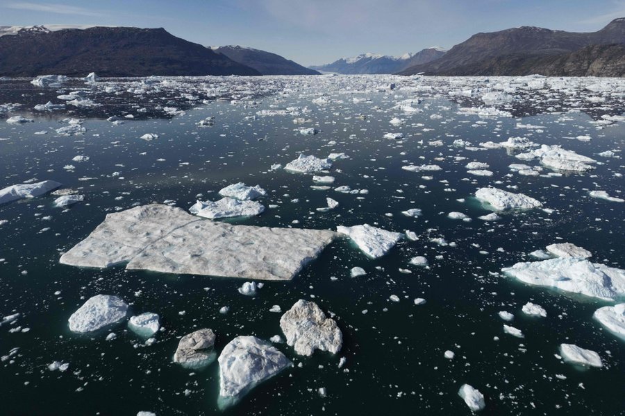 104112948-this-photograph-taken-on-august-16-2023-shows-different-sizes-of-icebergs-drifting-as-they.jpg