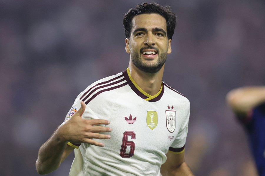 116490087-spains-midfielder-6-mikel-merino-celebrates-scoring-his-teams-second-goal-during-th.jpg